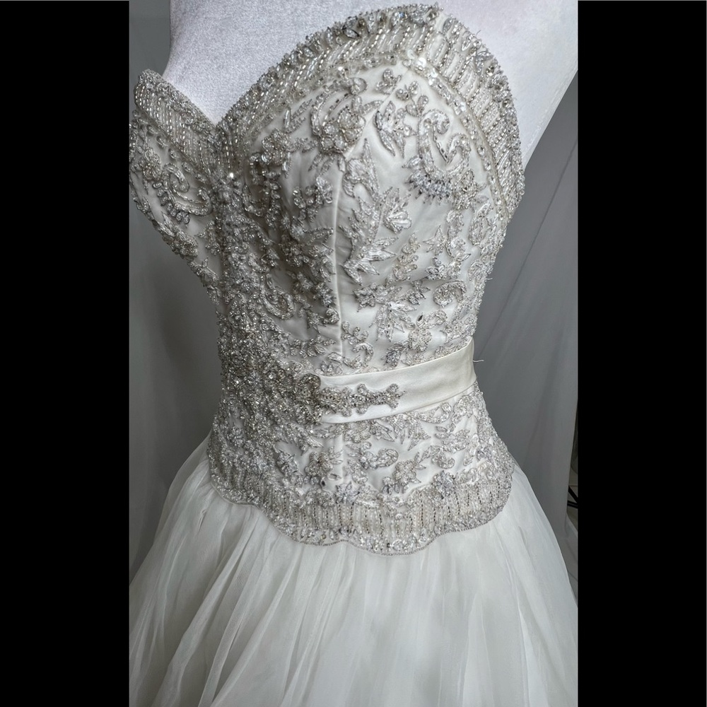 Wedding Dress strapless/cap sleeve tulle ball gown with beaded apliques.